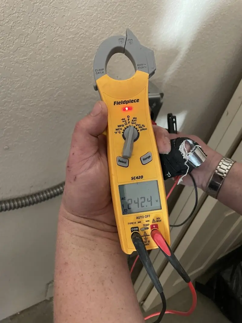 Voltage testing with clamp meter during Electrical Installation Services in Woodbury Heights